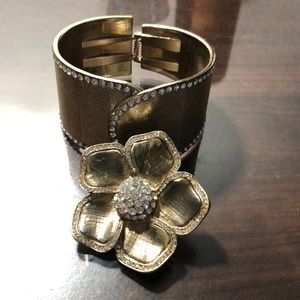 Gold tone bangle and flower ring